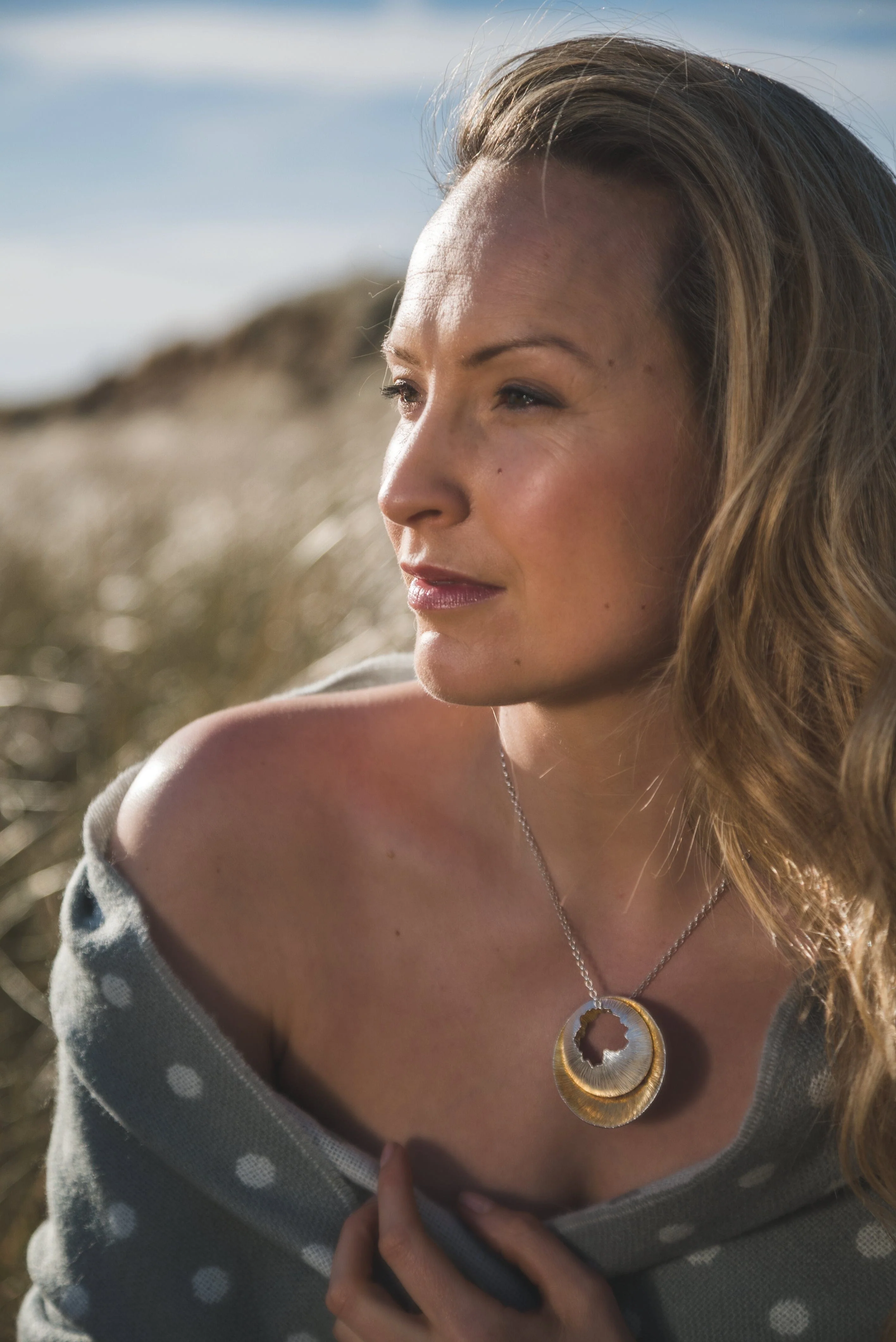 Martina Hamilton Logo